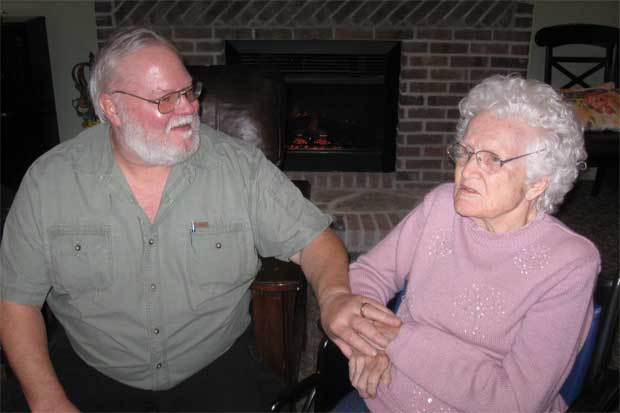 Fred Brown visits his mother, Betty, in a commons area at DayBreak Village in Kennesaw.