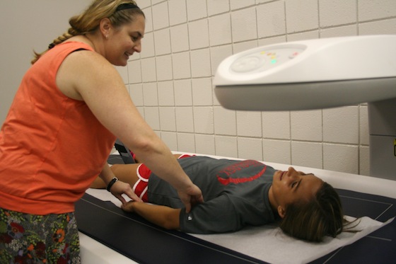 Exercise science students Rachelle Acitelli and Christie Ward test a scan in the University of Georgia's kinesiology department to measure body compositions that will be used in weight-loss research this fall.