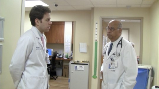 Dr. Sam Kini teaches emergency medicine to fourth-year med students in Athens.