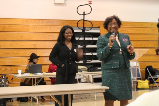 State Rep. Karen Bennett (D-Stone Mountain) speaks at an ACA education event at Fairfield Baptist Church as Enroll America's Whitney Horton looks on.