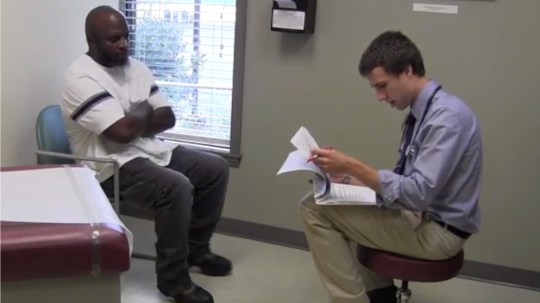 Med student Jonathan Swanson (right) volunteers at Mercy Health Center, a faith-based free clinic in Athens.