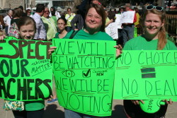 Sarah Lesley and her daughters joined a Capitol rally in February against the design of the state health plan.