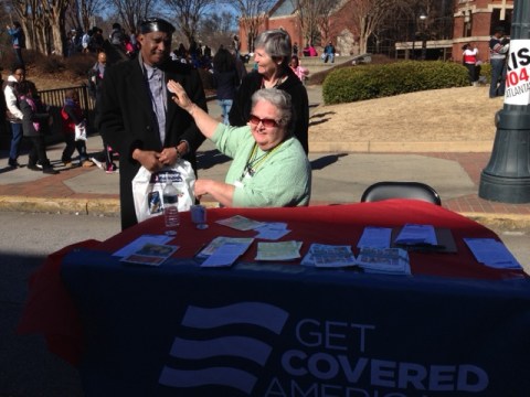 Cecelia Smaha (seated) and Sr. Joan Serda at a Get Covered America event in Atlanta