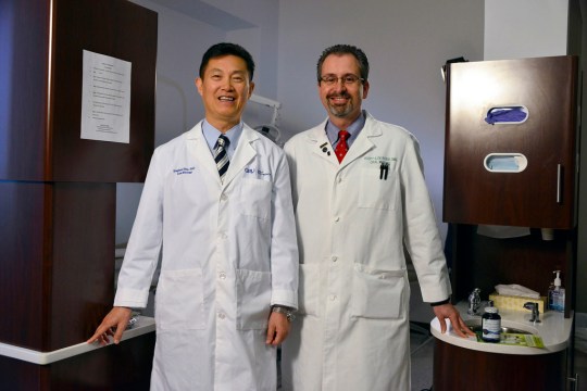 Georgia Regents University researchers Stephen Hsu (left) and Scott DeRossi say a clinical trial showed their lozenge containing green tea antioxidants produced a fourfold increase in saliva.