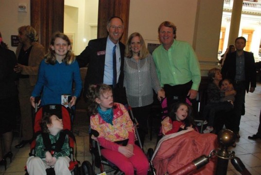 Rep. Allen Peake with the Hopkins family.
