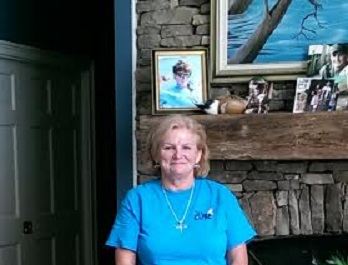 Janet McMahan with a photo of her son Ben.