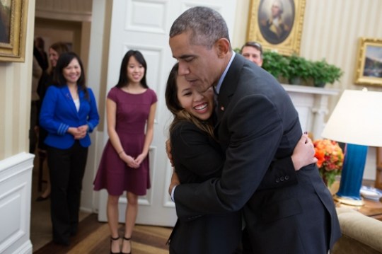 President Obama hugs Dallas nurse Nina Pham after she underwent successful treatment for Ebola. 