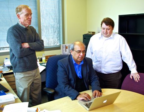Ashok Goel (seated) with colleagues at Georgia Tech