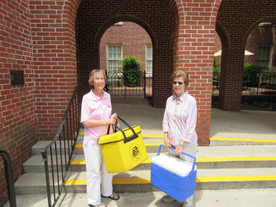 Billie Jo Correll (left) and Charlotte Patton after finishing their Meals on Wheels route