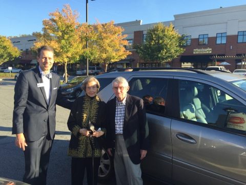 Eric Burkard (left) and honorees Lee & Laura Oakley arriving at the Atlanta Parkinson's Disease Association fundraiser in a car provided by Common Courtesy. 
