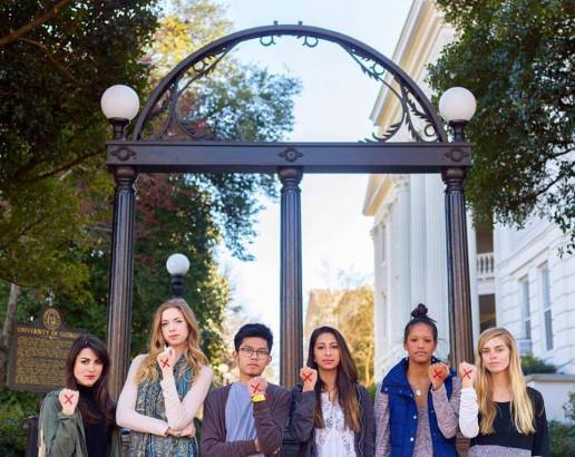 UGA members of EndIT with "X'' symbol, meaning end slavery
