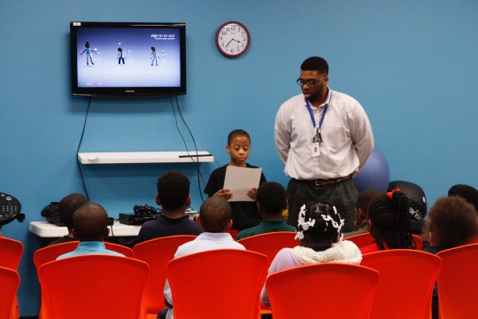 Patrick Smith leads a group leadership activity. 