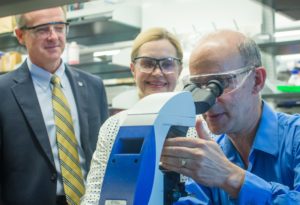 Dr. Patrick Frias of Children's Healthcare (left) and M.G. Finn of Georgia Tech join Mary Ellen Imlay at Children’s Pediatric Technology Center.