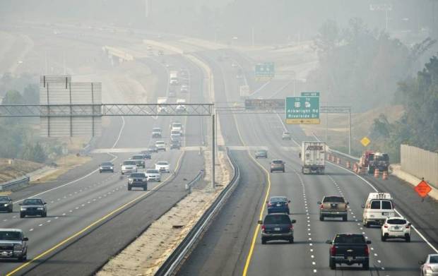 Smoke from wildfires hangs over Macon on Monday.